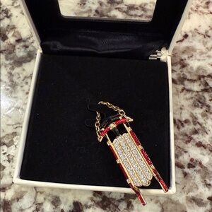 New in Box Swarovski Gold and Red and Crystal Sled Pendant